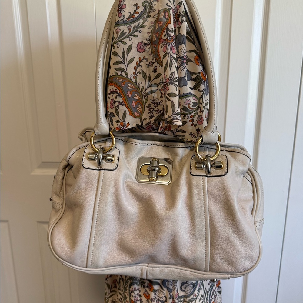 B. Makowski cream, leather, genuine satchel.